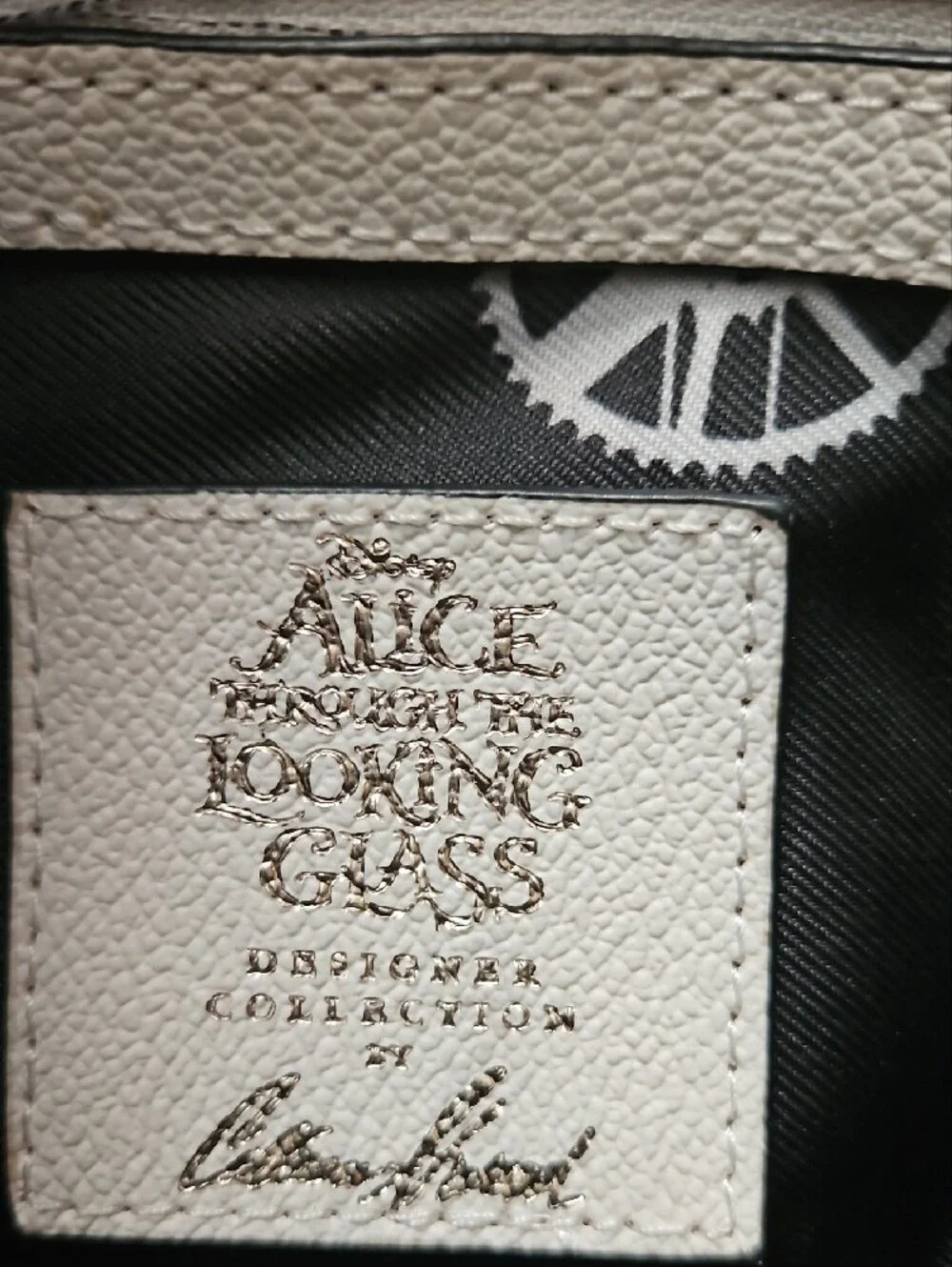 Disney White & Black 'We're All Mad Here' Wristlet Clutch